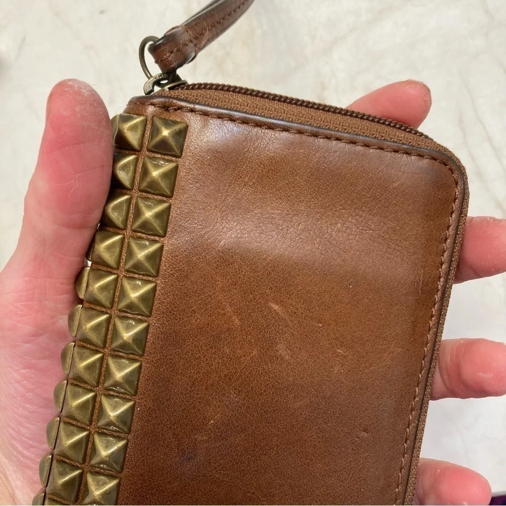 Coach brown weathered leather wristlet wallet